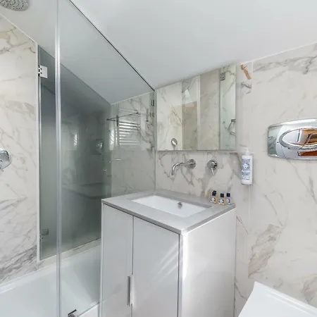 Style And Comfort In Downtown Apartment